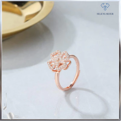 Nhẫn bạc nữ dạng xoay độc lạ đính đá CZ hình cỏ 4 lá bên trái
